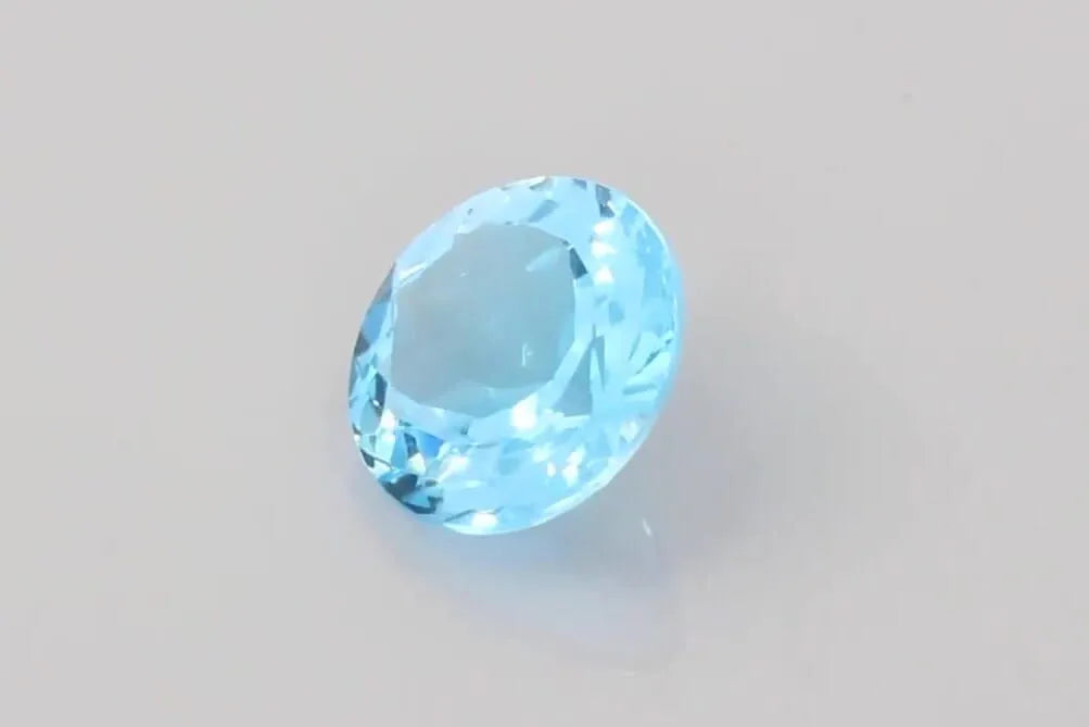 10.93ct Round Natural Topaz (Colour Blue, Clarity Slightly Included, Cut Faceted)
