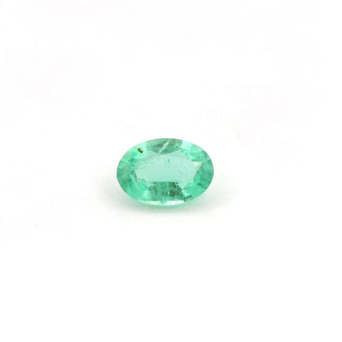 0.77ct Oval Natural Emerald (Colour Green, Clarity Slightly Included, Cut Faceted)